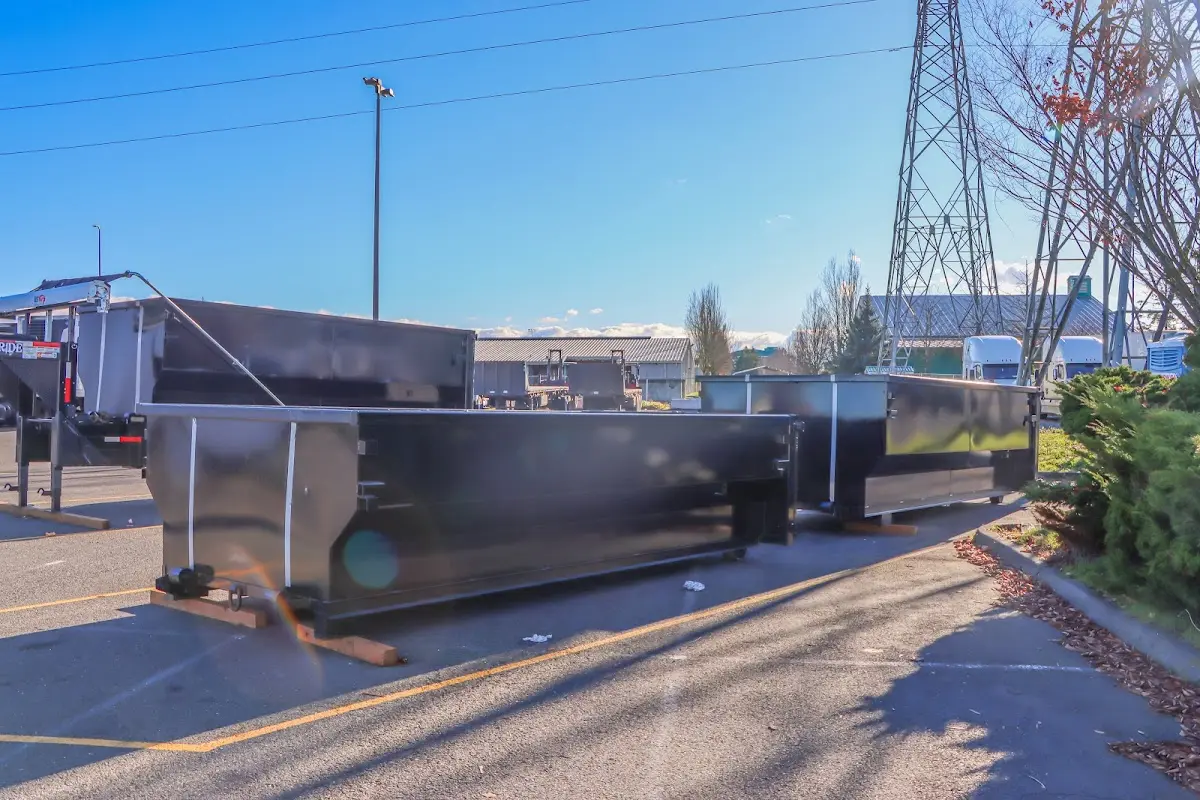 Roll-off dumpster ready for waste disposal at job site for 15 Yard Dumpster Rental in Newington